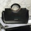 Elegant Metallic Handle Shoulder Bag