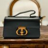 Elegant Leather Handbag with Gold Buckle
