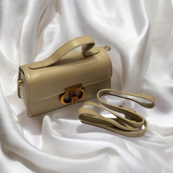 Elegant Leather Handbag with Gold Buckle - Image 11